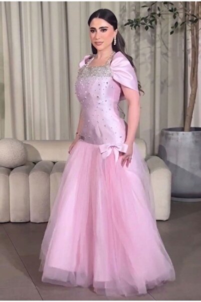 NALA FASHION A Soft Pink Evening Gown, Designed in a Regal Style That Combine...