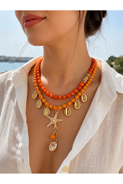 ANKA JEWELLRY قلادة نسائية من الفولاذ بتفاصيل نجم البحر والصدف البحري مع خرز ...