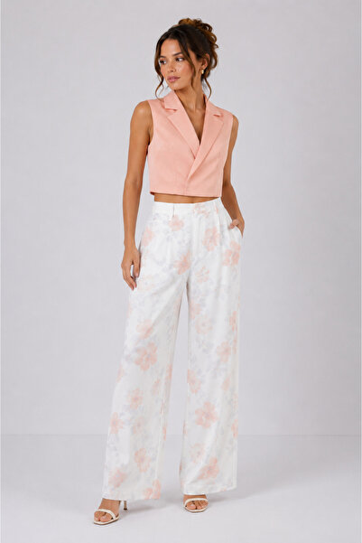 2TRENDY بلوزة نسائية لف بياقة بليزر بدون أكمام لون وردي