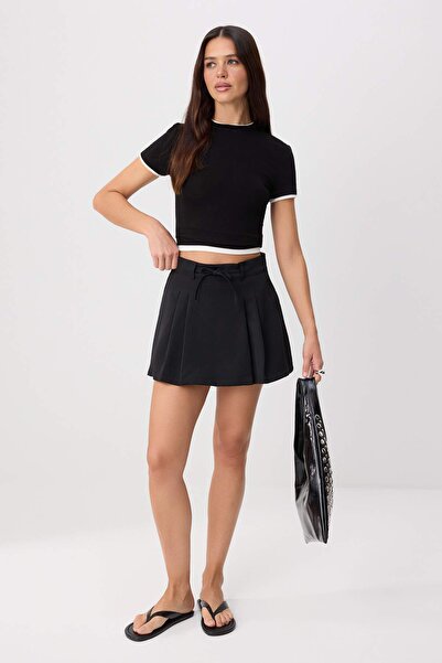 Колекція Trendyol Чорна плісирована міні-спідниця з тканого полотна Look Sort...