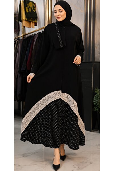 NOUR Crepe Fabric with Lace Trim on a Dotted Fabric, Cut into Cloche Shapes.