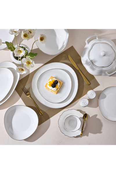 Malooki Muzi 45-piece porcelain dinner set, white with gold trim, organic des...
