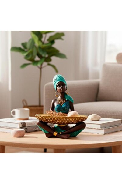 Generic African decorative statue with golden serving dish