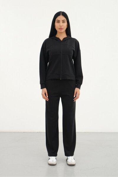Shooter Sportswear بدلة رياضية نسائية سوداء بقلنسوة وسحاب من الأمام وأرجل واس...