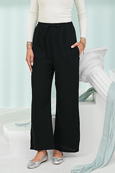 İmajButik Crne muslinske pantalone sa elastičnim strukom i džepovima