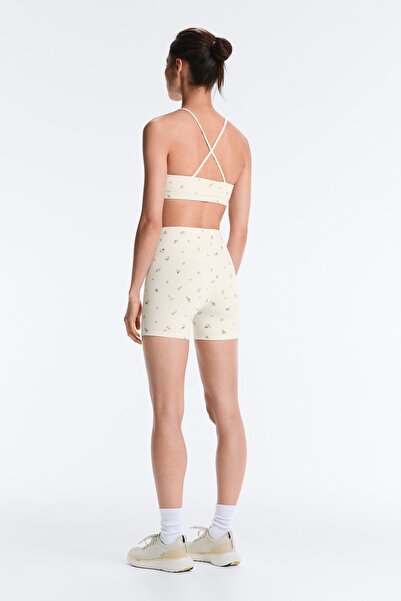 Oysho Evermove high-rise 10cm hot pants with floral print