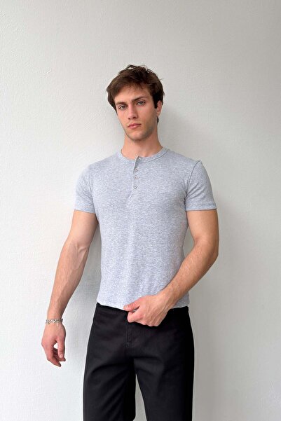 Flaw Wear تي شيرت مضلع بأزرار