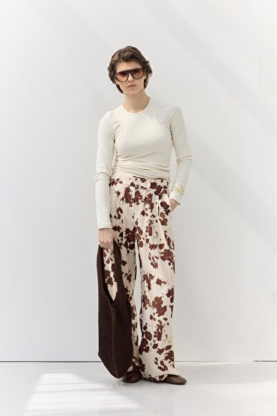 KADRİYE BAŞTÜRK Animal Patterned Trousers Cream