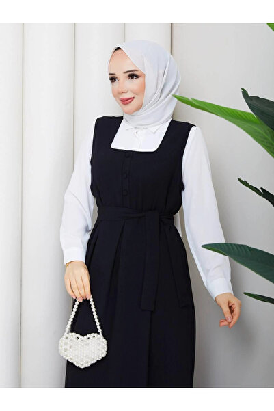 Butik Siyah Krep Kumaş Sıfır Kol Düğme Detaylı Elbise Modelimiz