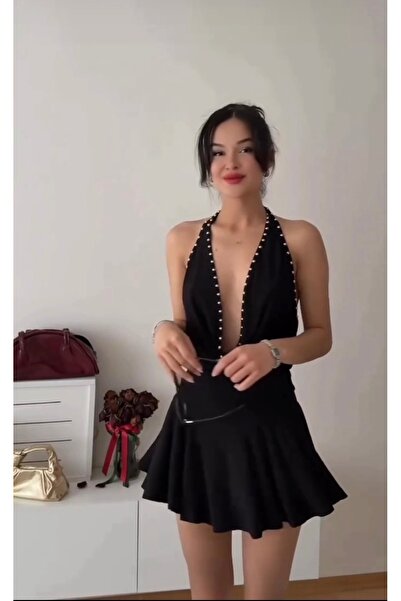 MODA The new season dress with staple details, degaje collar and shorts is ve...
