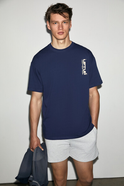 GRIMELANGE Antonio men's navy blue oversize knitted t-shirt with print detail...