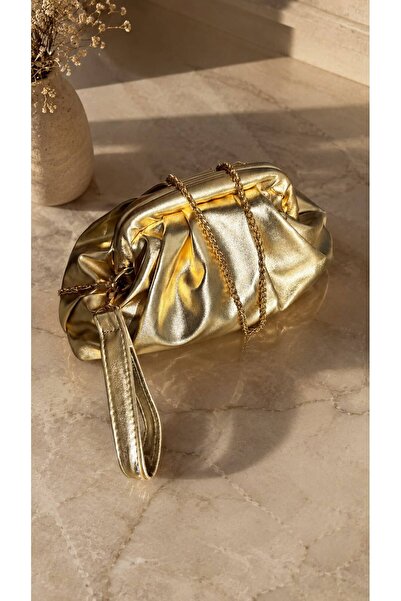 Swaggo collections Women's Leather Gold Clutch Bag