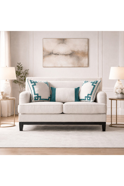 Roots Furniture كنبة يونانية مرتفعة بلون أبيض مائل للصفرة