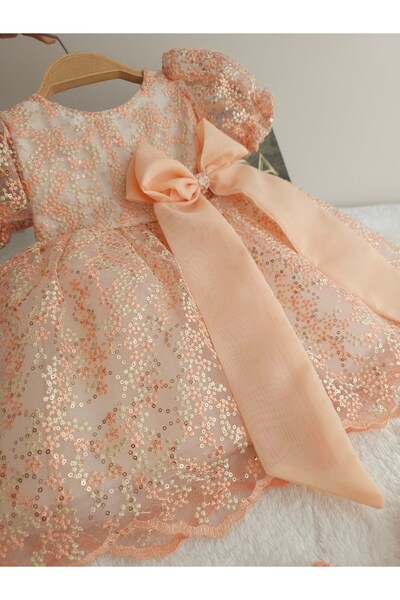 Elwirababyboutiqe فستان مزين بتفاصيل من ترتر السلمون