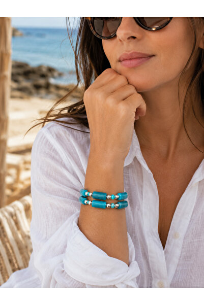 COCOSH TAKI Dark turquoise blue and silver beaded multi-strand bracelet.