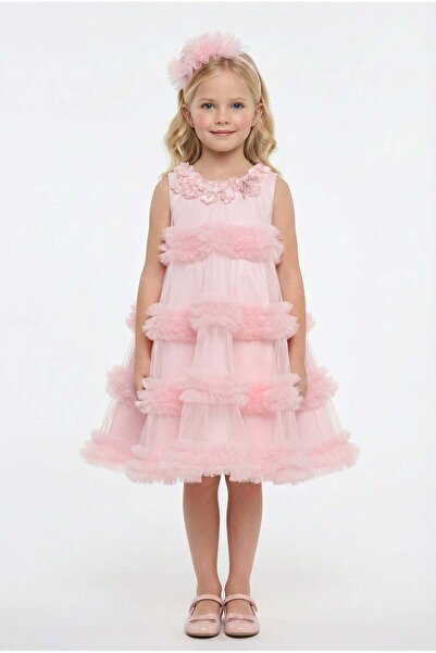 NAFASH Soft Pink Tulle Dress, Combining Childlike Elegance with Dreamy Layers...