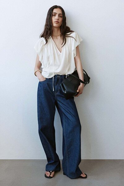H&M Oversized lace-trimmed blouse