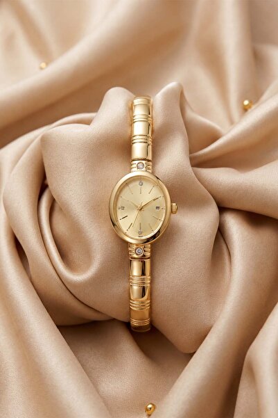 The Watch Meira Women's Gold Steel Cuff Watch – Champagne Dial with Stone Det...