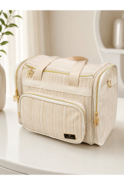 Baby Gift شنطة مواليد متعددة الجيوب – تصميم أنيق ولون كريم