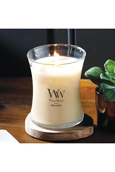 WoodWick شمعة معطرة بيضاوية الشكل، برائحة الفانيليا، 16 أونصة |   وقت احتراق ...