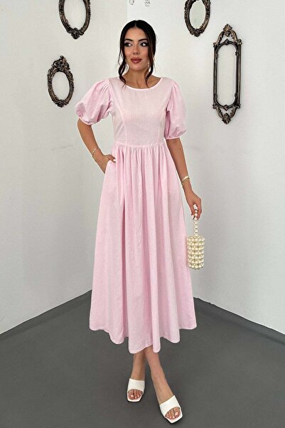 Moda Days فستان نسائي وردي اللون بأكمام بالون وتفاصيل ربط من الخلف وجيب وحزام...