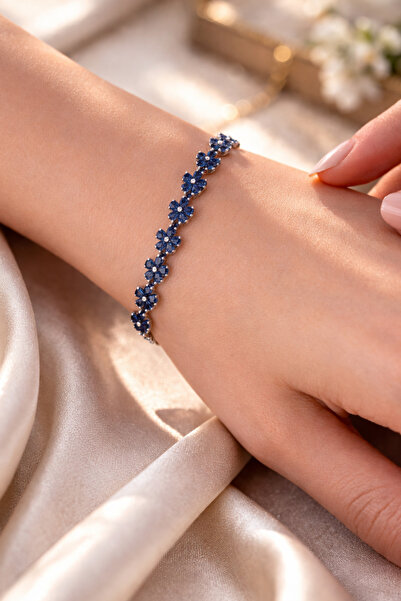laria jewelry سوار على شكل زهرة اللوتس باللون الأزرق الداكن مع حجر مائي