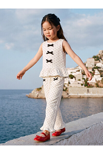 LC Waikiki Trendlucky: bow-detailed gabardine pants for girls