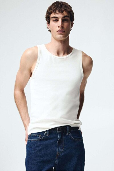H&M قميص صدرية مضلعة بقصّة Slim Fit