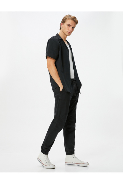 Koton Joggerhose mit Spitzenbund, lockerem Schnitt und Tasche