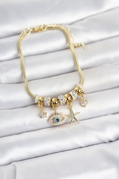 Inure Jewelry سوار نسائي من النحاس بلون ذهبي مع تعليقة على شكل عين