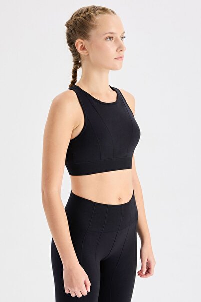 COMEUP Αθλητικό σουτιέν με ανάγλυφες ρίγες και λαιμόκοψη halter, μαύρο