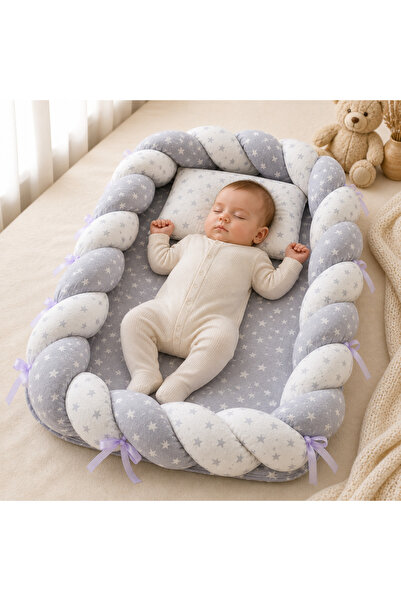 Bebelul Baby Nest cocon tricotat gri cu perna si saltea din muselina