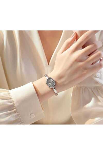 Evaa Jewelry Accessories ساعة يد نسائية بسيطة بدون حجر من كي ليمبتش