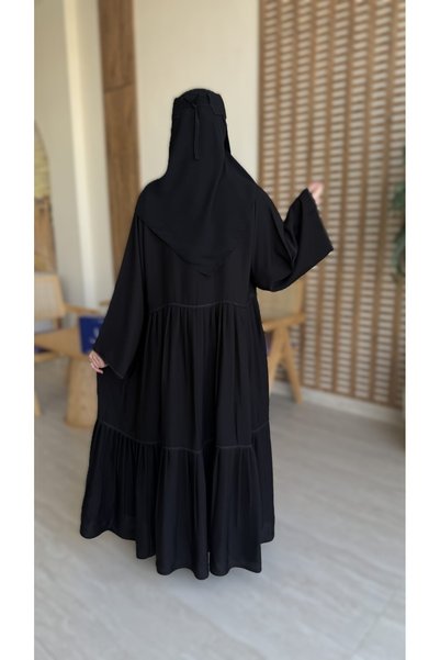 Dana Practical Abaya Suitable for Occasions and Work, Made of Royal Internet Fabric, Dark Black Color.