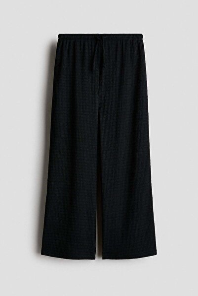 H&M بنطلون جيرسي محكم