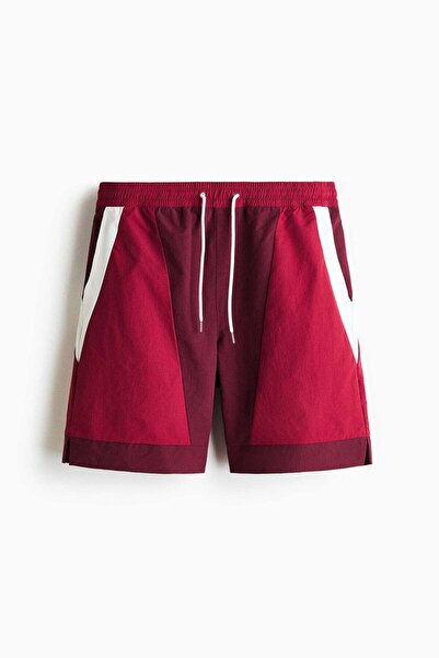 H&M شورت رياضي فضفاض