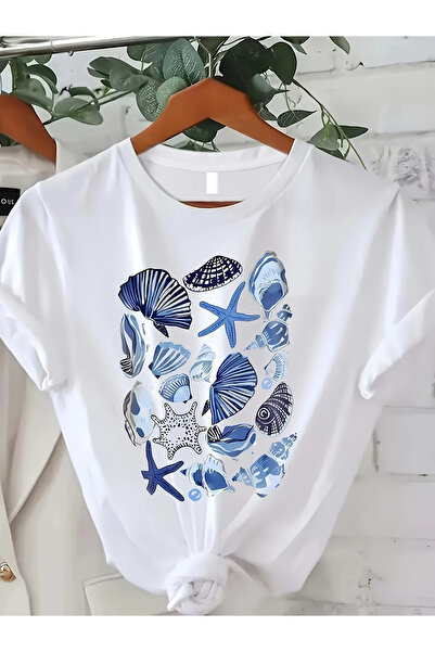 STITCHLY تي شيرت نسائي أزرق بتصميم صوراً لصدف البحر ونجم البحر - ملابس شاطئية...