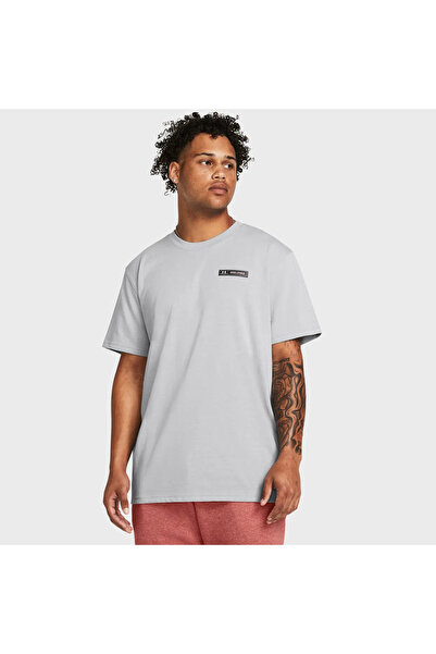 Under Armour Ανδρικό μπλουζάκι με γιακά πόλο σε γκρι χρώμα, με στάμπα Heavywe...
