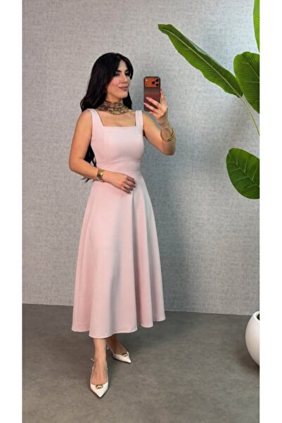 Gökyüzü Moda فستان نسائي طويل من الكريب المحلي بياقة مربعة وحزام ربط من الخلف...