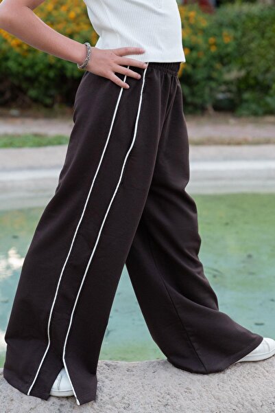 Breeze Pantaloni de trening pentru fete, cu buzunare duble laterale și tiv de...