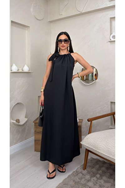 miraylawear FAYE SİYAH RENKLİ BOYUNDAN BAĞLAMALI SALAŞ TARZ KADIN MAXİ ELBİSE