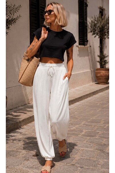 ibeeka Tencel fabric premium textured balloon leg pants beige - white color