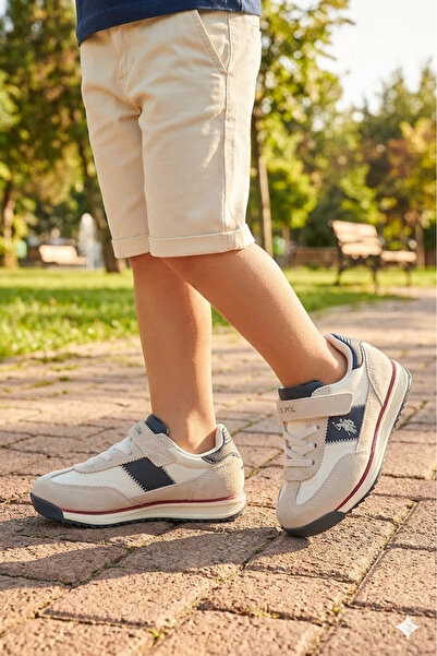U.S. Polo Assn. حذاء رياضي للأولاد باللون الأزرق الداكن