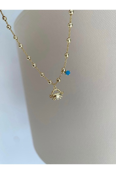 Bade Jewelry سوار قدم أنيق من الفولاذ المقاوم للصدأ مزين بخرز أزرق ذهبي وتفاص...