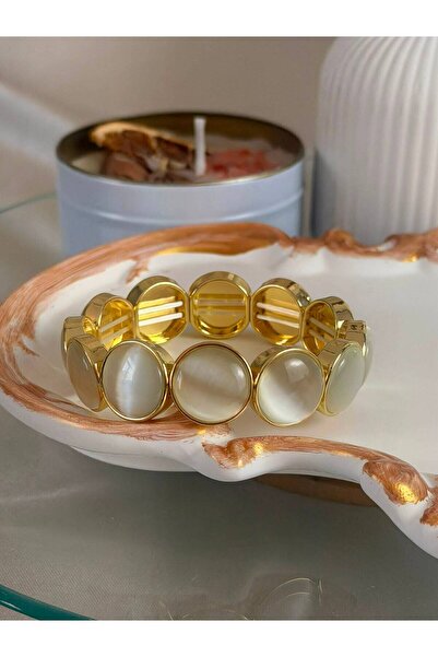 ANKA JEWELLRY سوار نسائي من الفولاذ باللون الذهبي مع حجر عين القط الأبيض المرن