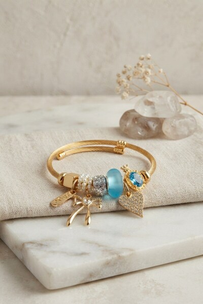Inure Jewelry سوار بفيونكة وقلب أزرق