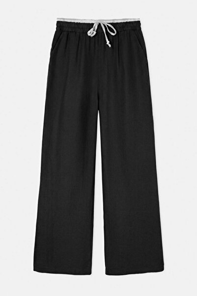 Drop by TrendyolMilla Crne mušlinske pantalone sa elastičnim strukom i podesi...