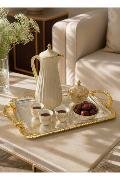 ALQANNAS A 3-piece serving tray set made of high-quality, modern stainless steel with a gold finish.