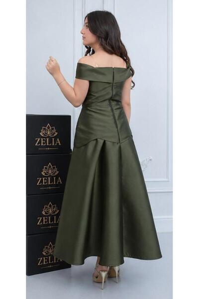 zelia فستان أخضر زيتوني ميكادو بكتف مكشوف يُظهر الشباب بشكل مبهر