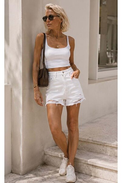 ibeeka Luna white asymmetrical waist detailed ripped denim shorts